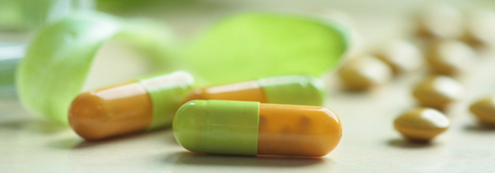 Chiropractic Canton GA Supplements Green & Yellow Pills